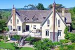 View more images of THE FRENCH COUNTRY HOUSE - Pahoia, Tauranga The French Country House lit up at night